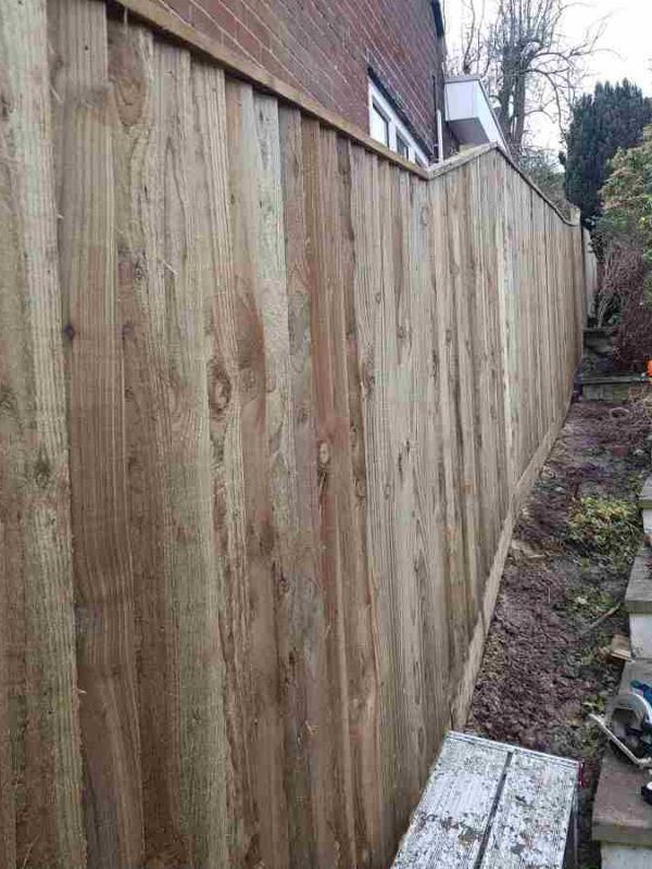 completed fence downhill