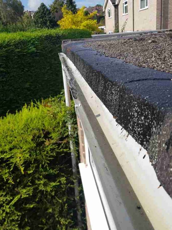 stone clearing of of gutters